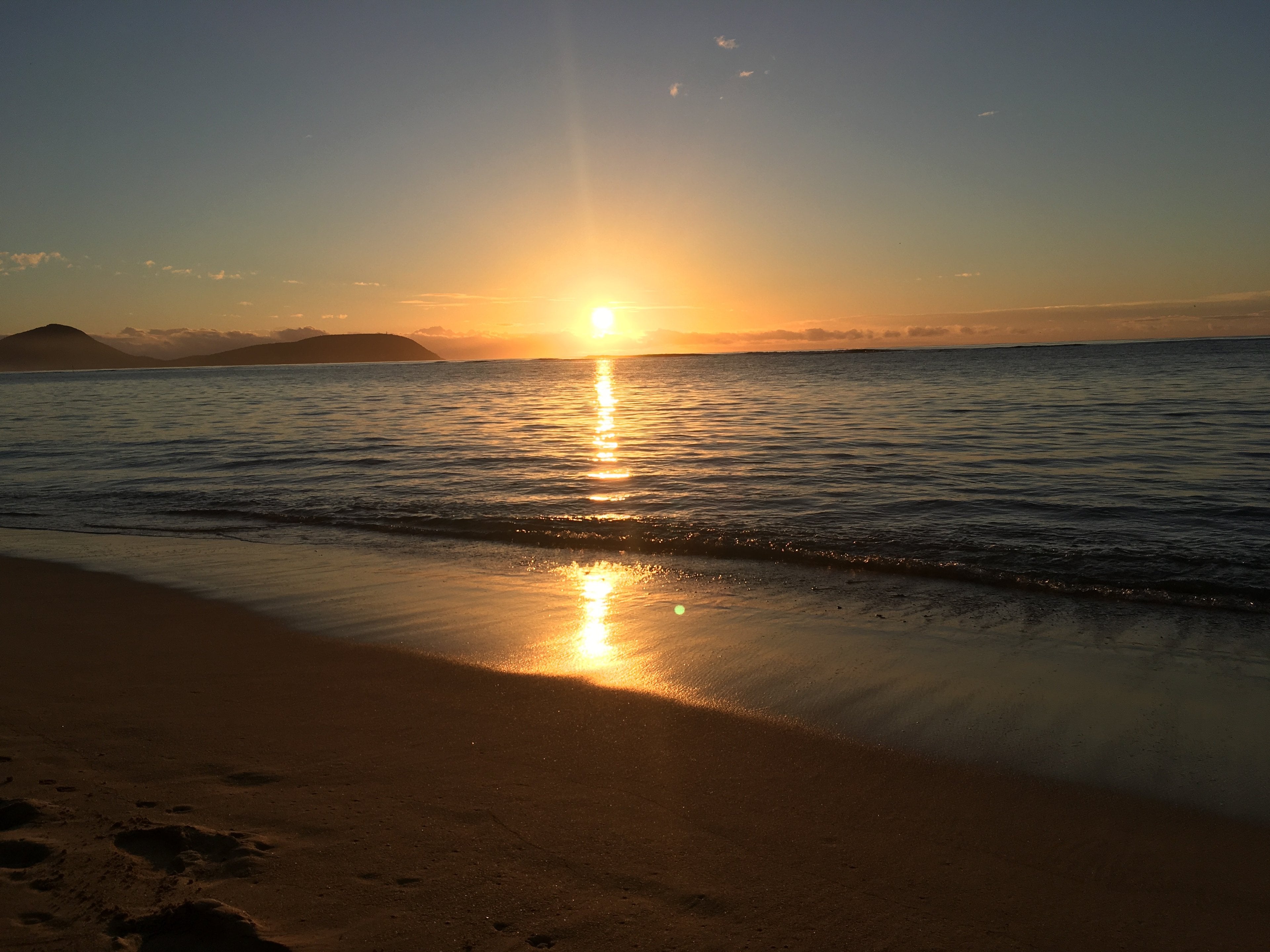Sunrise over the water at Kāhala