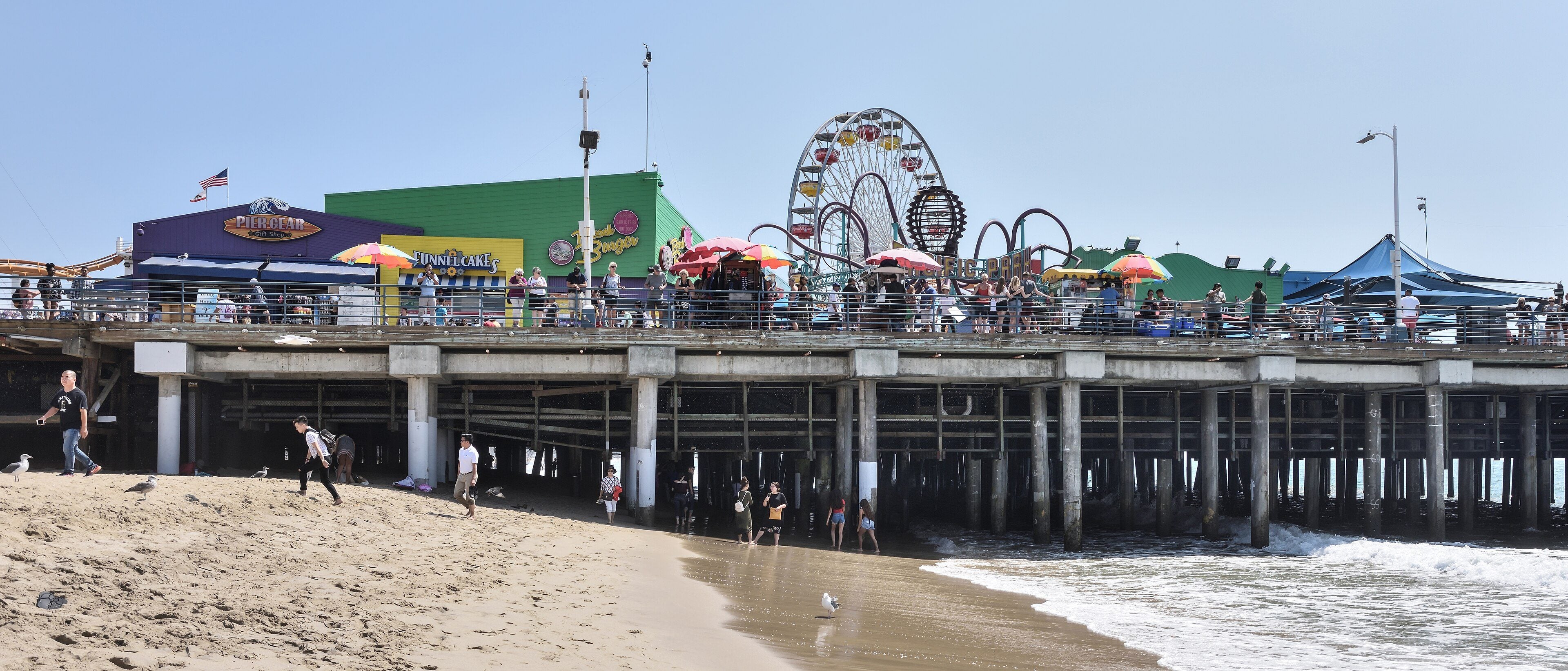 Santa Monica Pier and its Ferris wheel from the beach