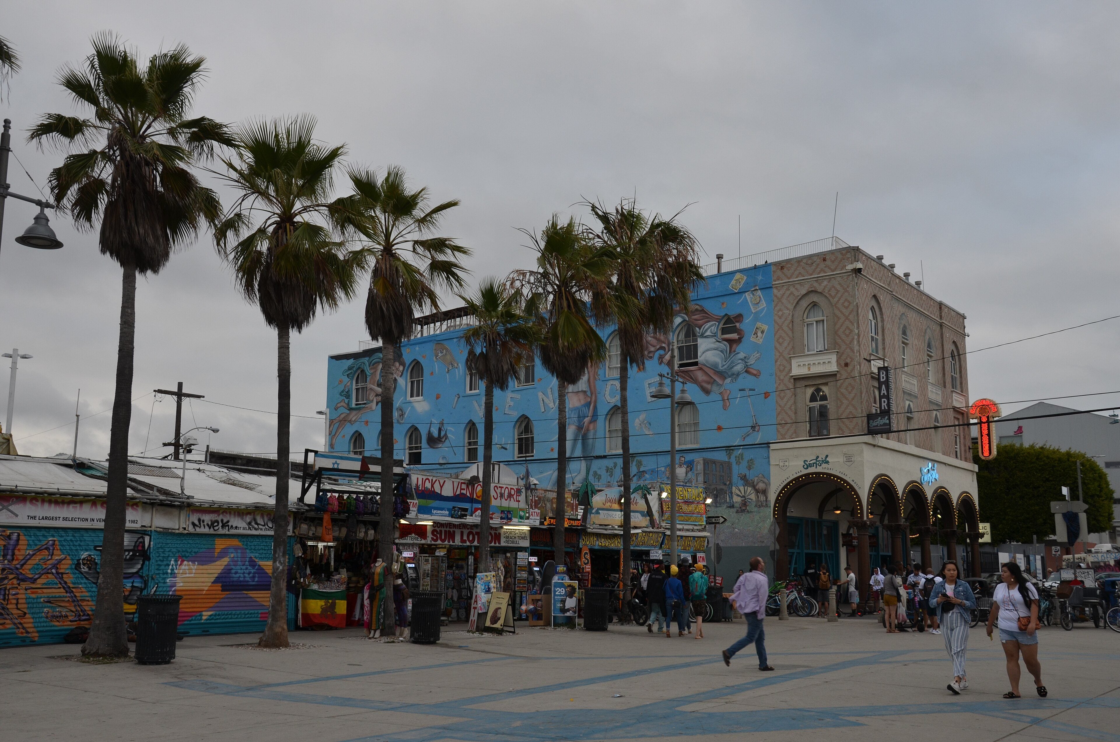 Palm trees and murals on the Venice Beach Boardwalk