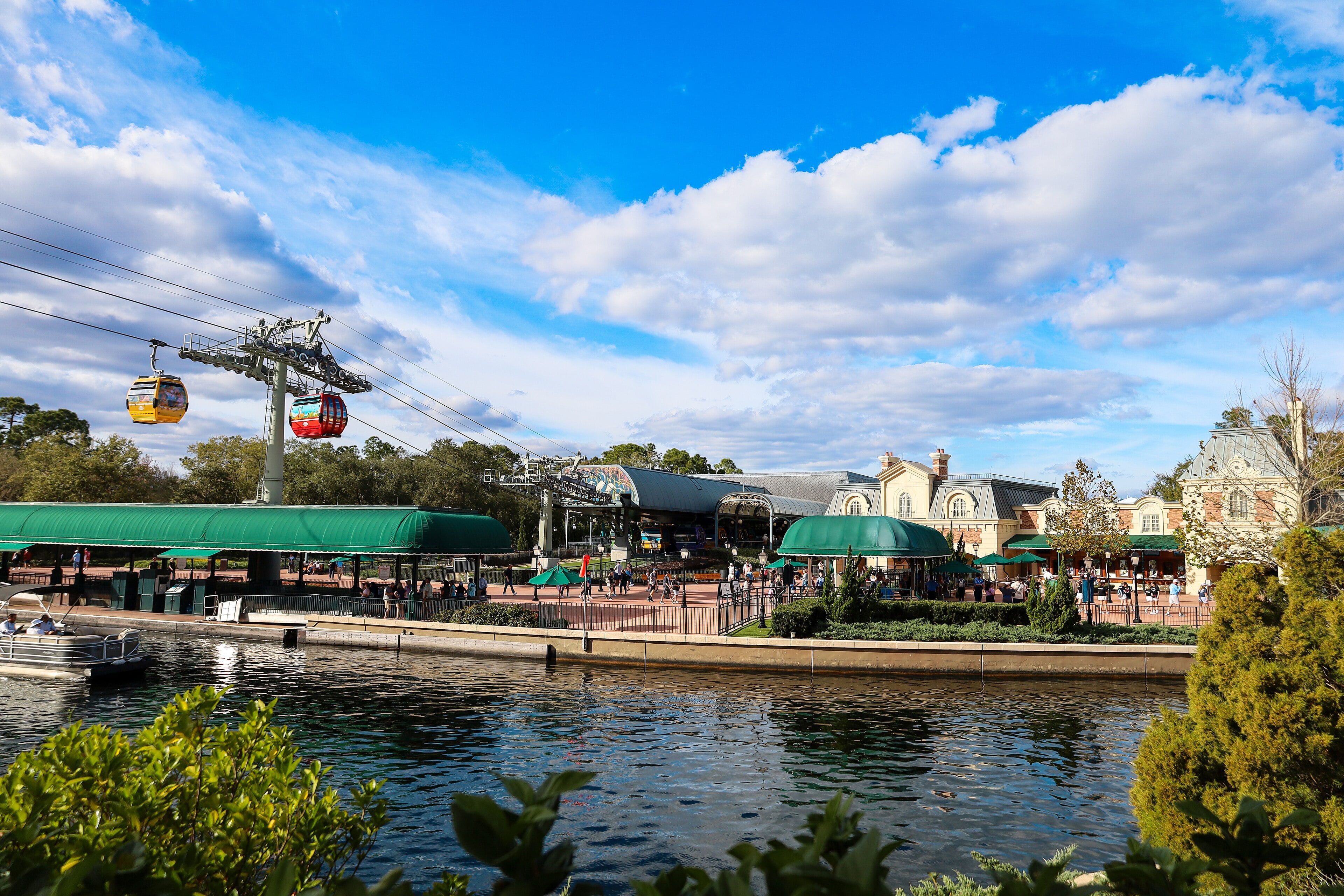 Disney Skyliner gondolas over EPCOT's International Gateway