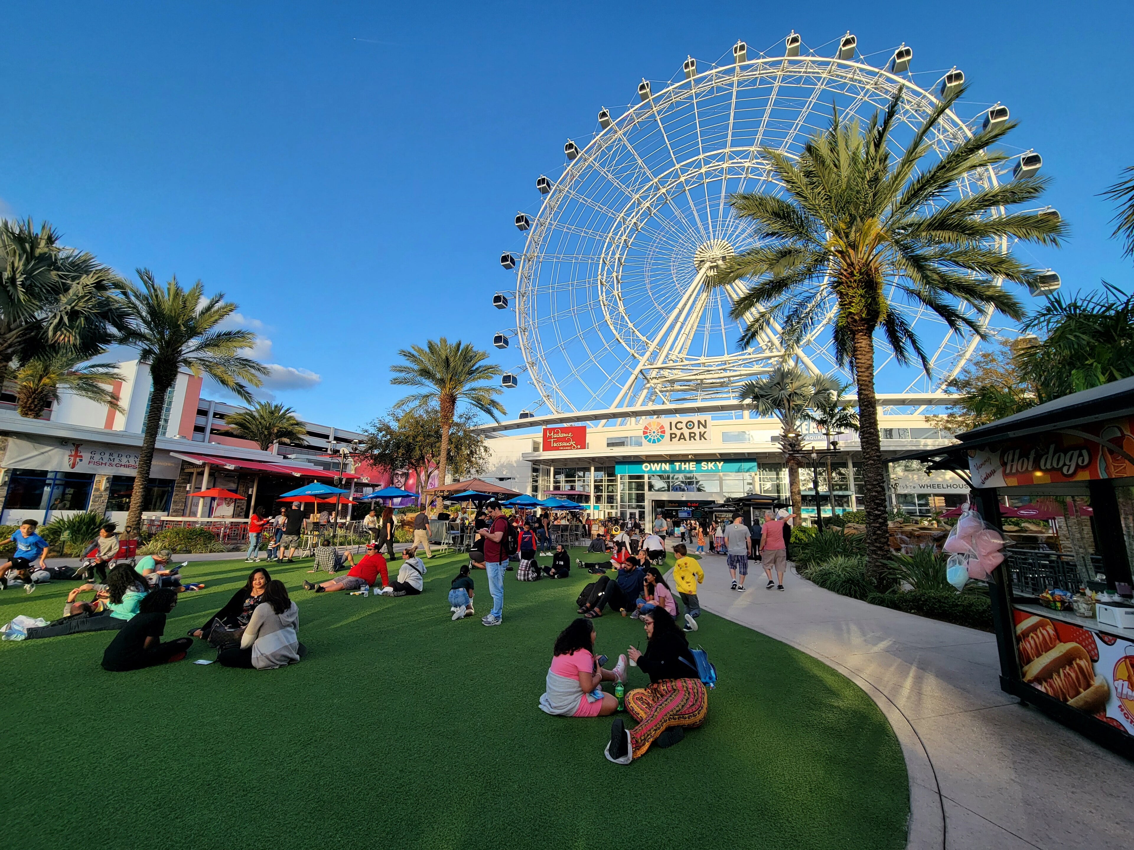 ICON Park on International Drive with the wheel lit green