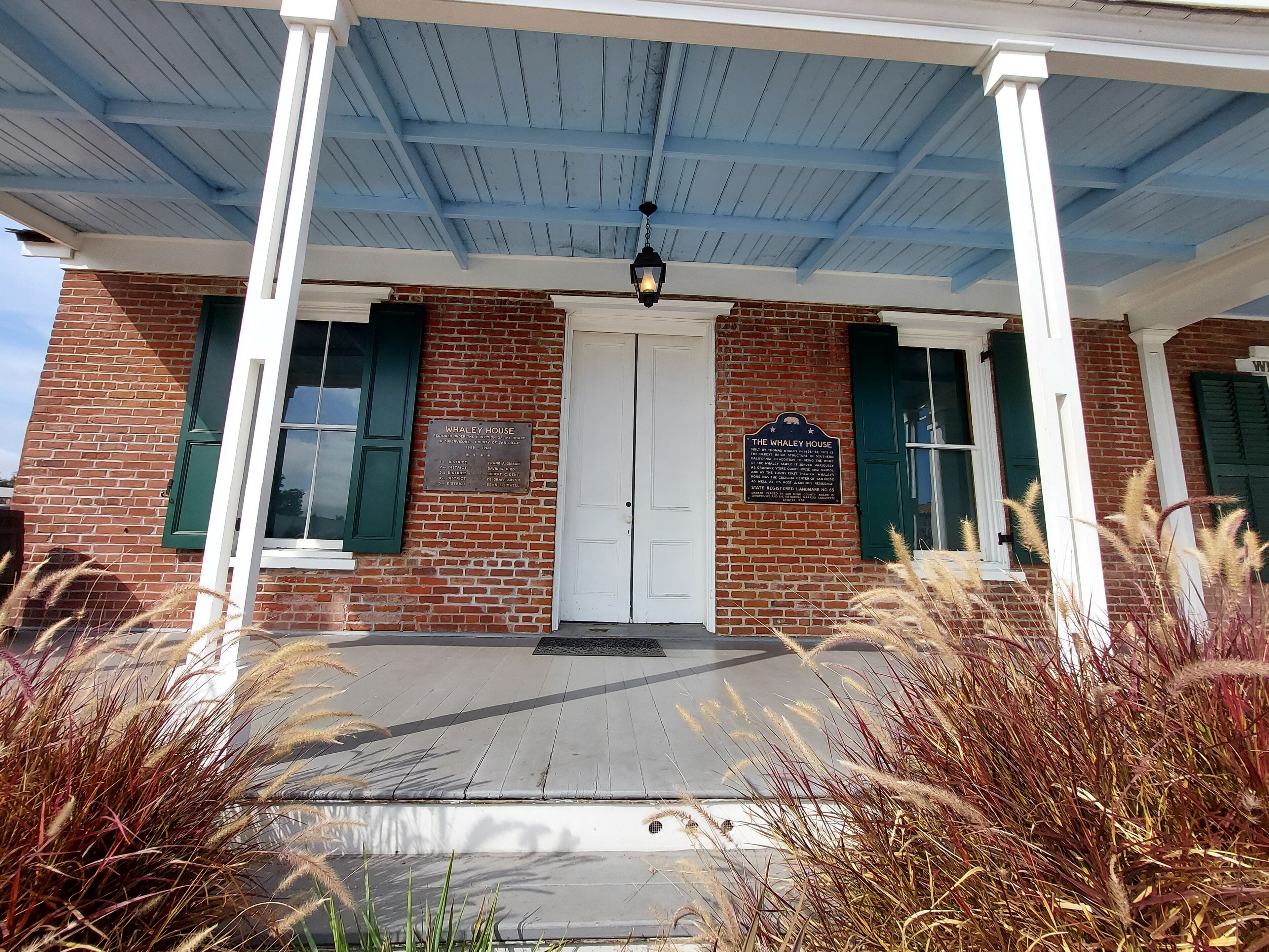 The brick porch of the 1857 Whaley House in Old Town