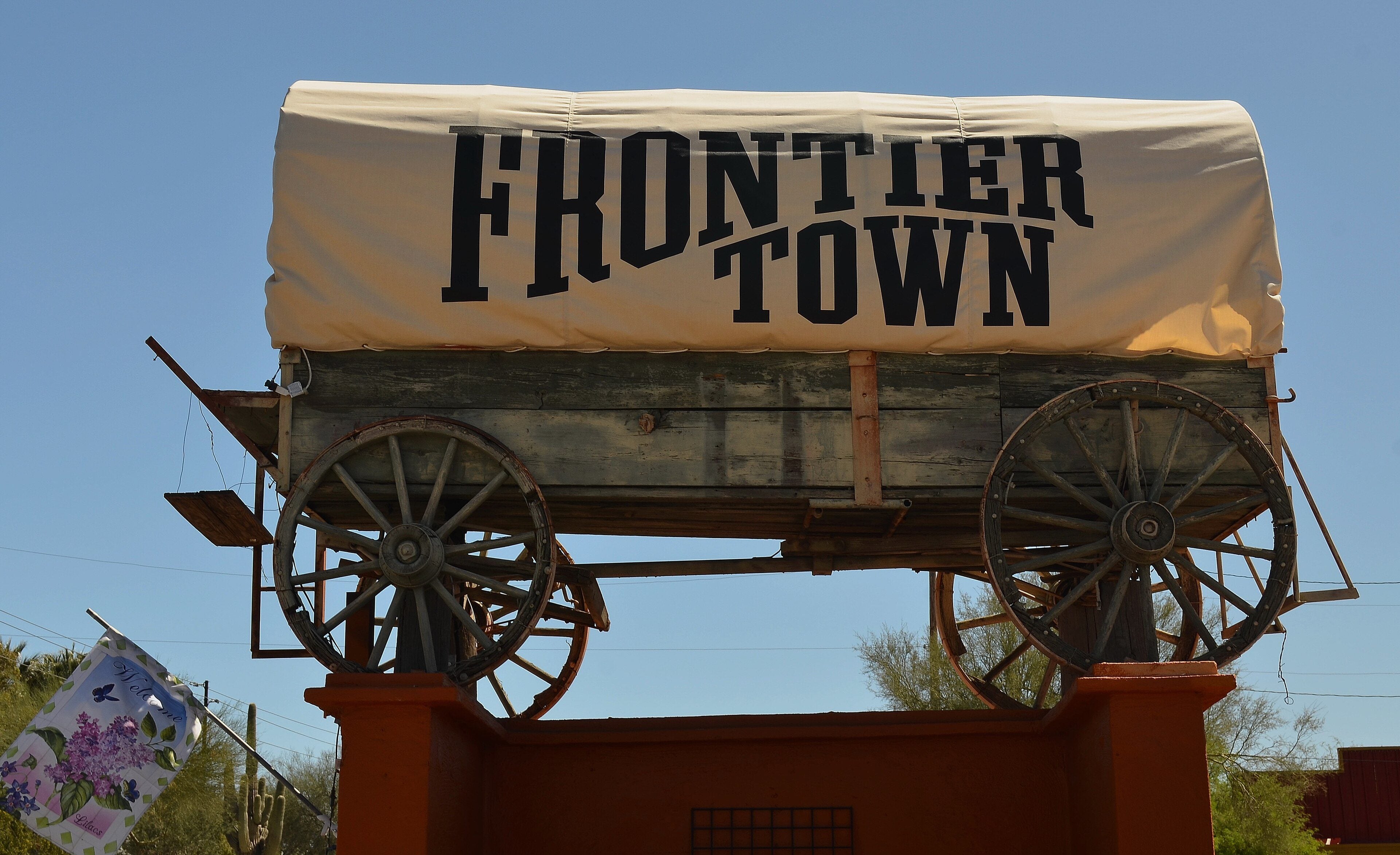 Frontier Town's covered-wagon sign in Cave Creek