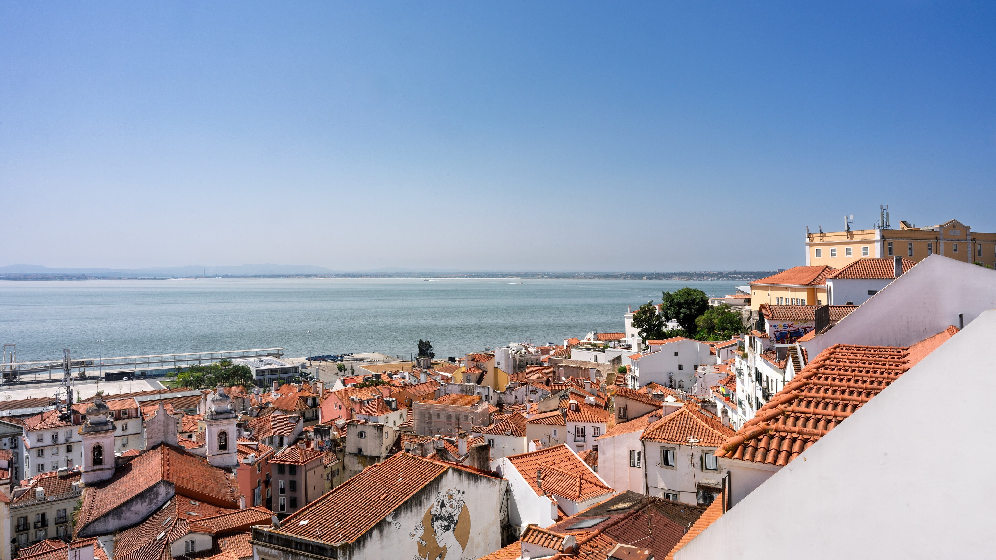 Alfama’s rooftops above the Tagus