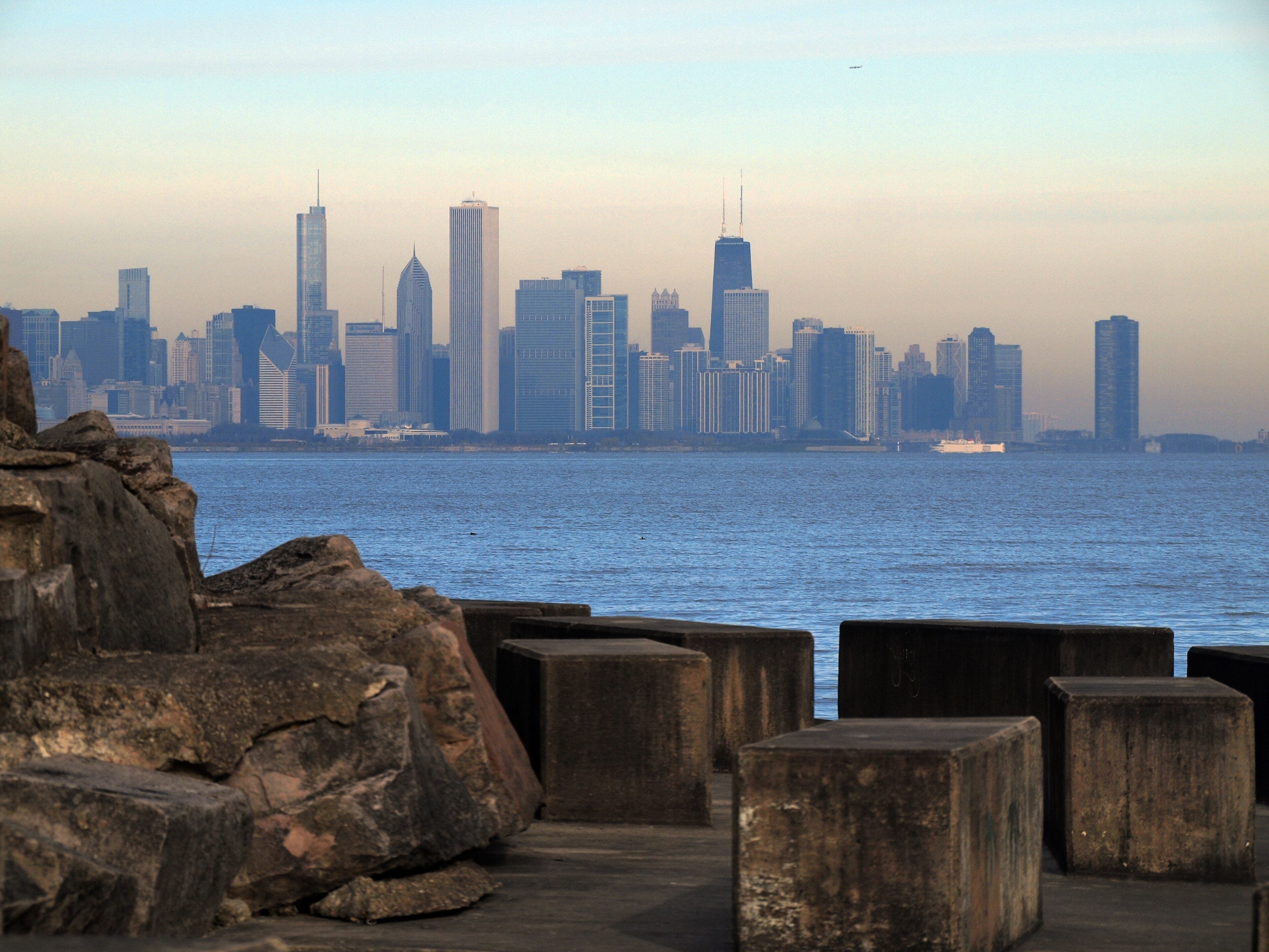 The Chicago skyline across the lake from Promontory Point