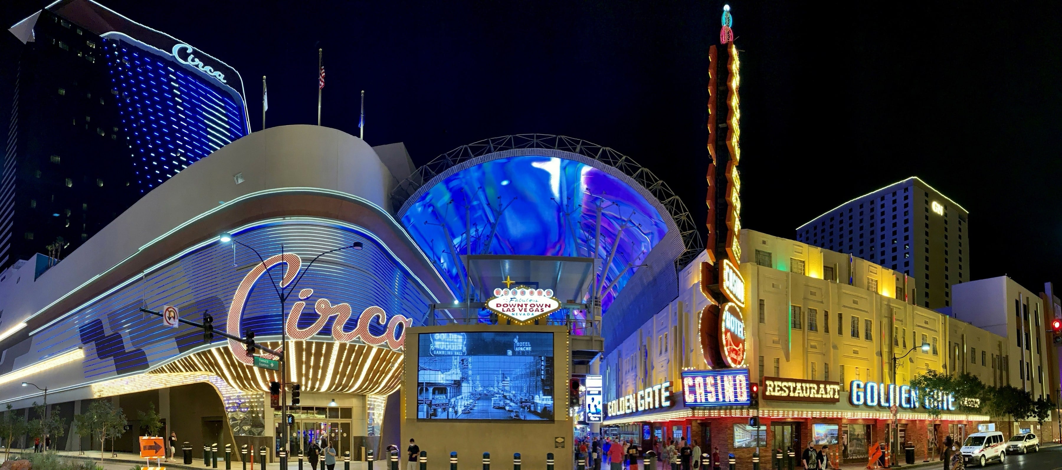 Circa, the Golden Gate and the Fremont Street Experience canopy lit up at night downtown