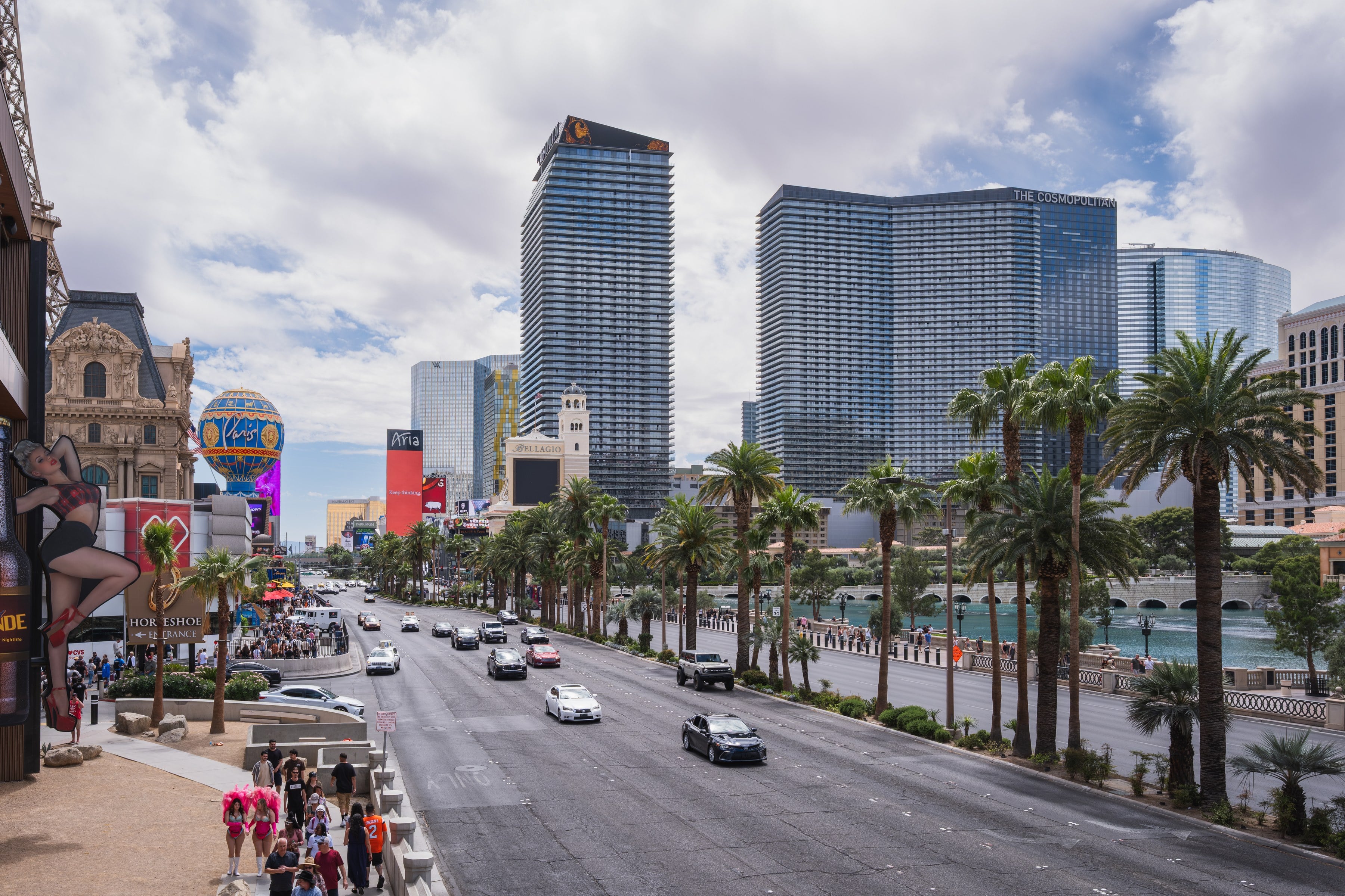 Las Vegas Boulevard by day, palm-lined median and Center Strip towers