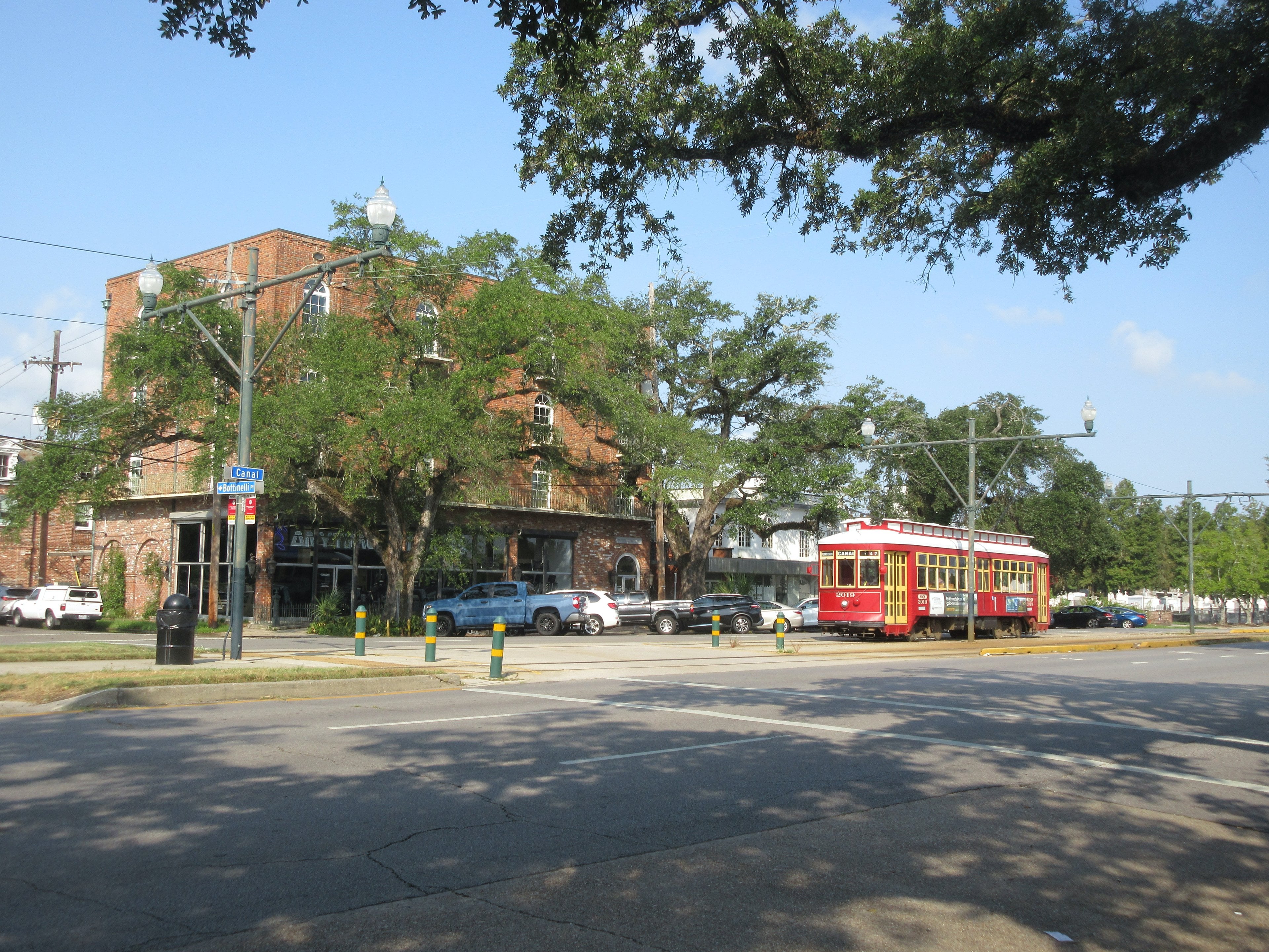 A red Canal streetcar in Mid-City
