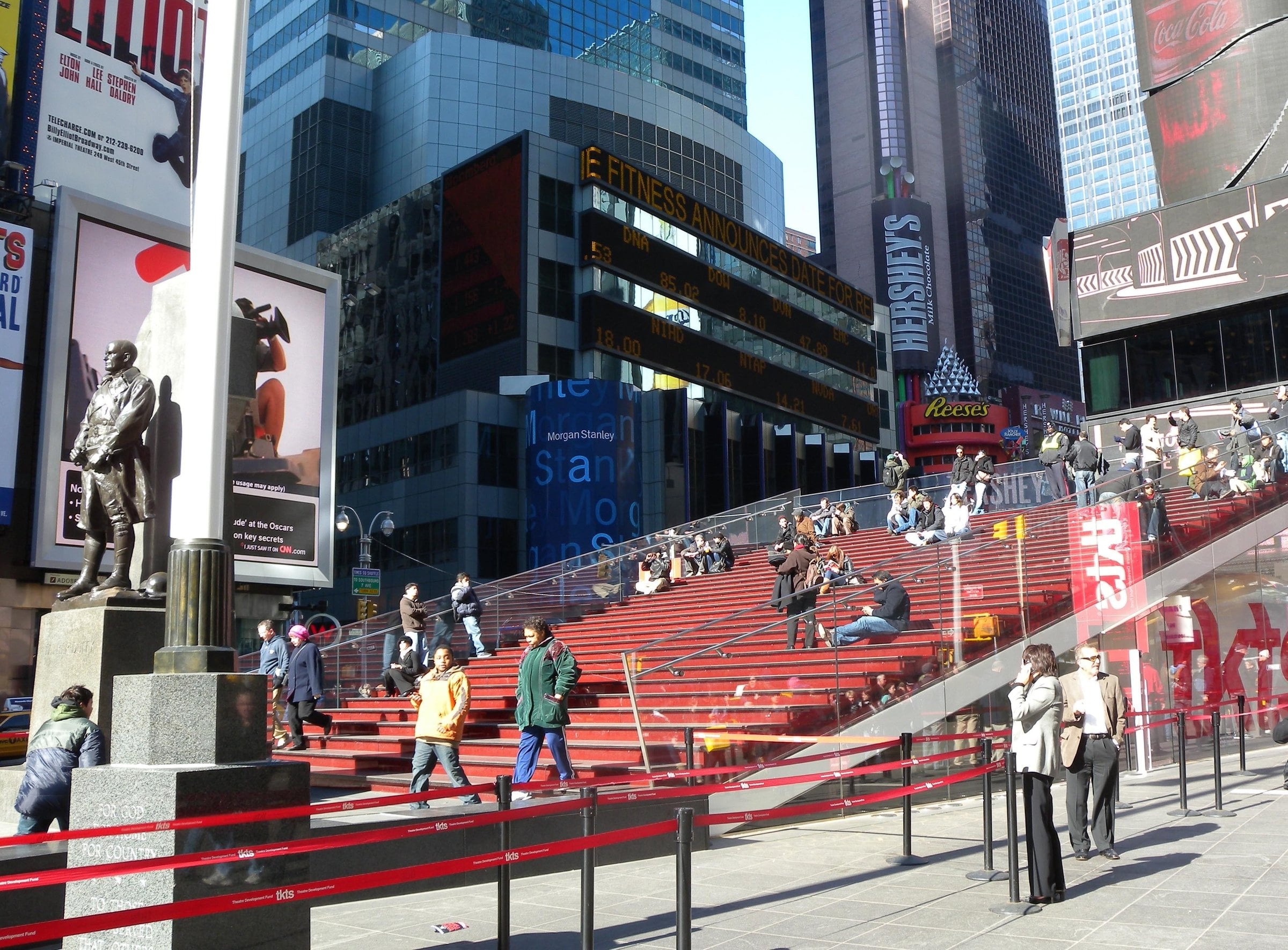 Red TKTS steps in Times Square in sunshine