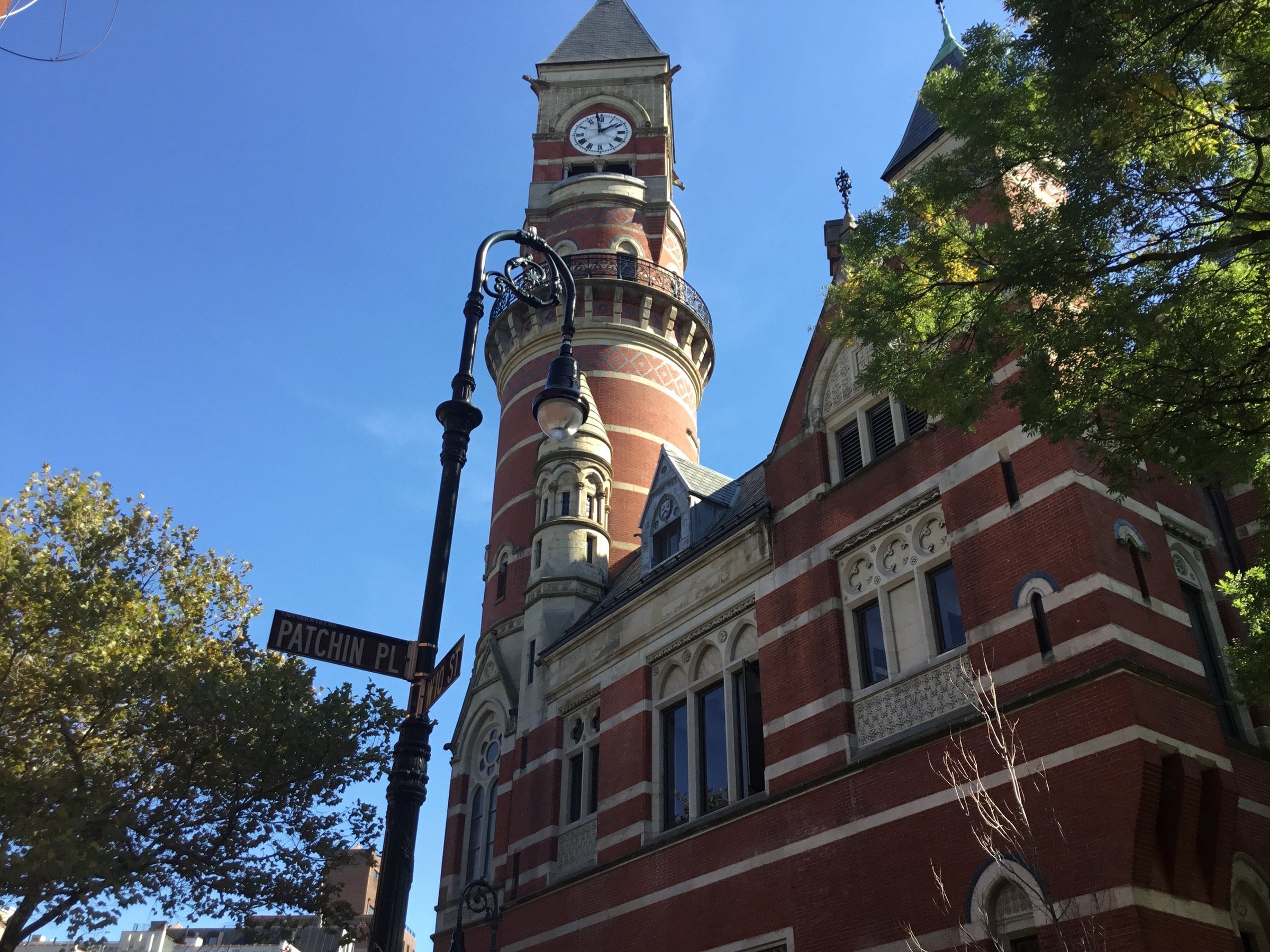 Jefferson Market Library clock tower against blue sky