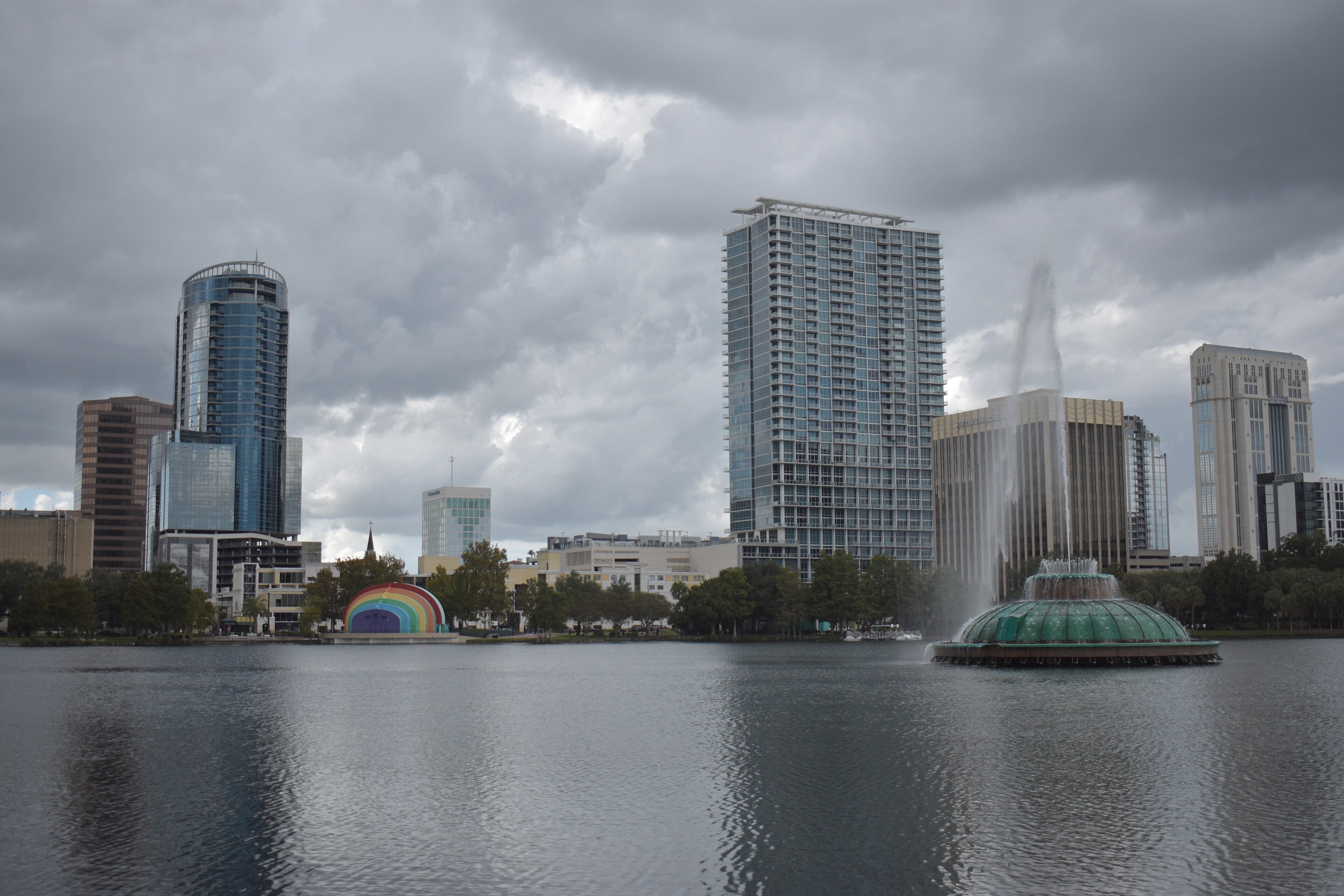 Lake Eola with the downtown Orlando skyline behind it