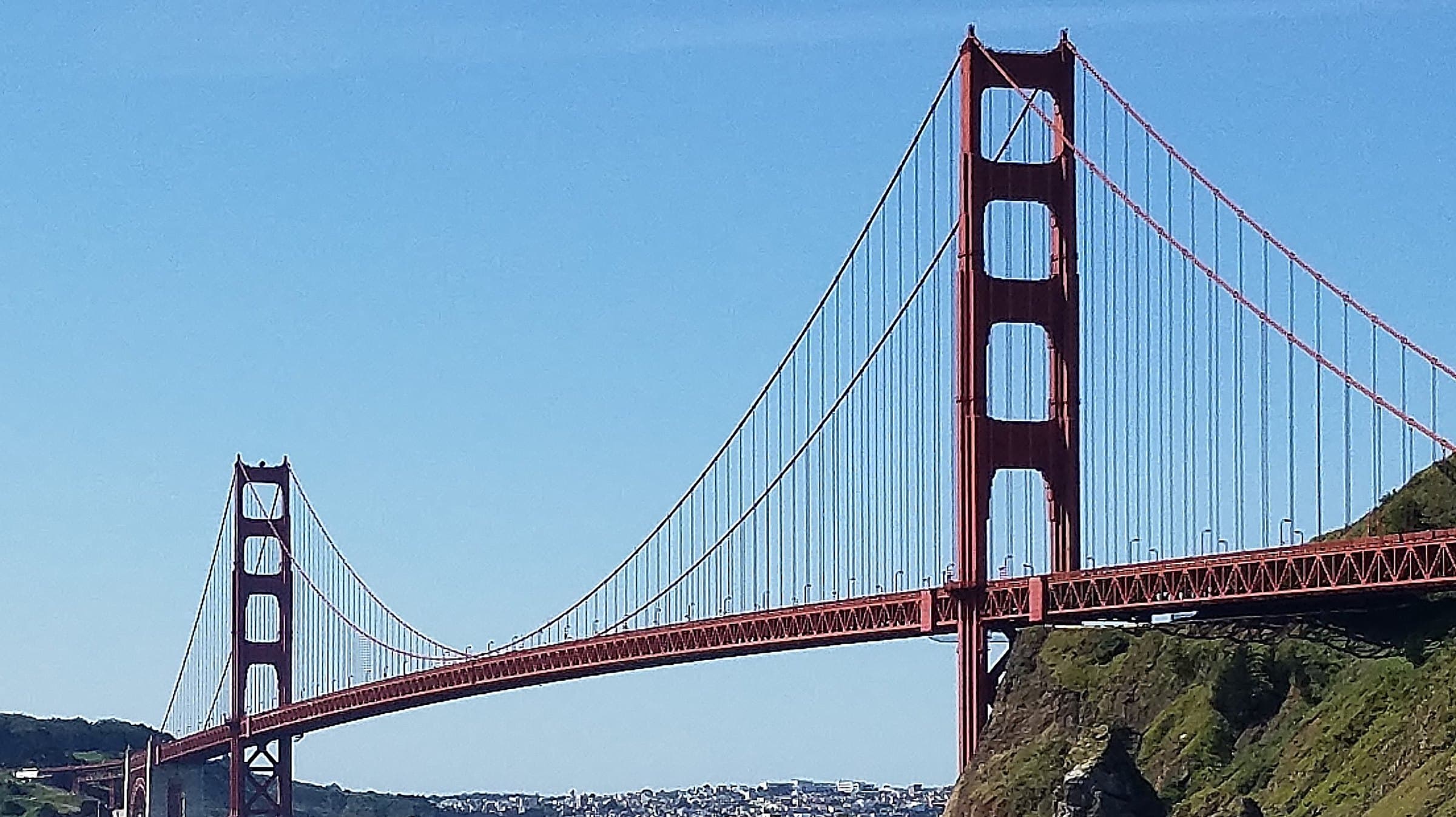 Golden Gate Bridge spanning the bay with San Francisco beyond