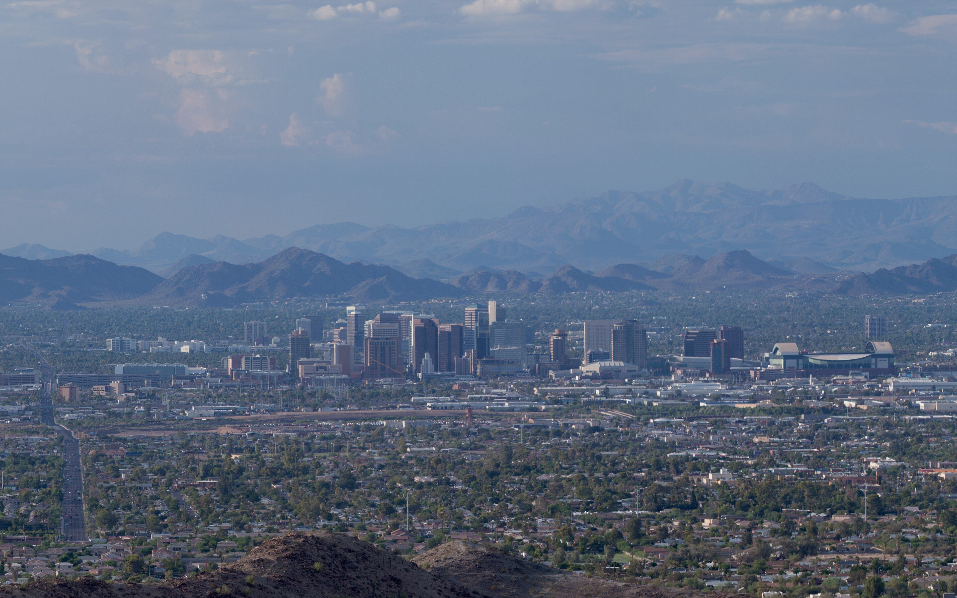 Downtown Phoenix skyline with mountains behind